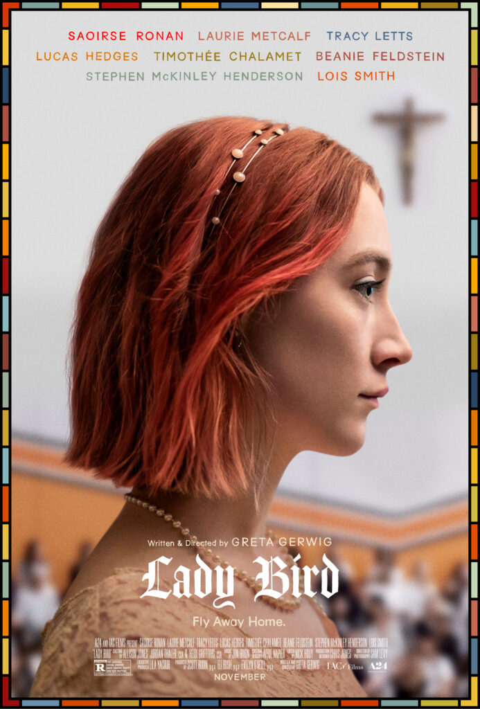 Poster film Lady Bird dengan gambar karakter utama, Lady Bird (Saoirse Ronan), menatap ke depan dengan ekspresi serius. Dikelilingi oleh warna-warna cerah di bagian tepi poster dan tulisan besar bertuliskan "Lady Bird" di bawah gambar.